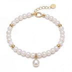Elegant Freshwater Pearl Bracelet with Gold Accents and Teardrop Pendant