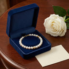 Elegant Freshwater Pearl Bracelet with Gold Accents and Teardrop Pendant