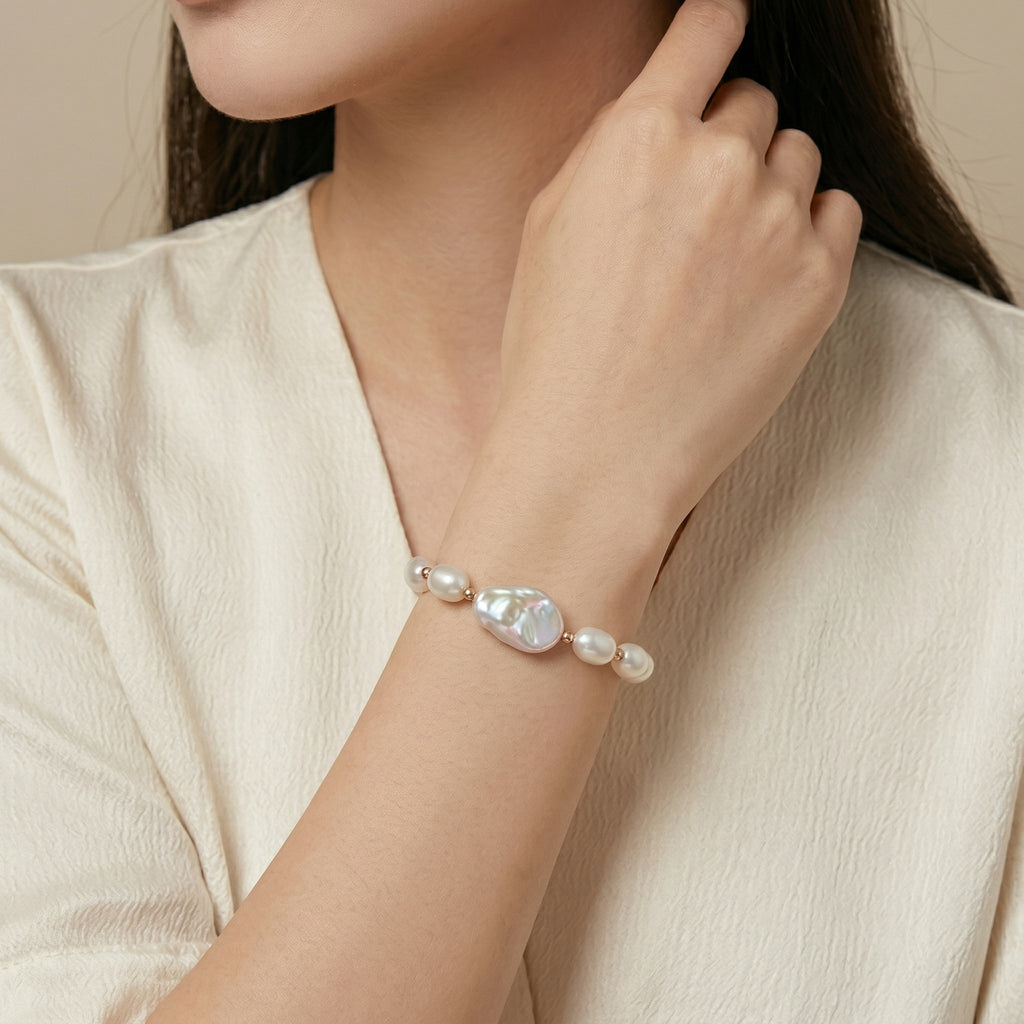 Elegant Freshwater Pearl Bracelet with Rose Gold Accents and Baroque Pendant