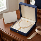 Elegant Pearl Necklace with Star and Butterfly Pendant