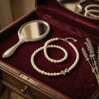Elegant Pearl Necklace with Silver Butterfly Pendant