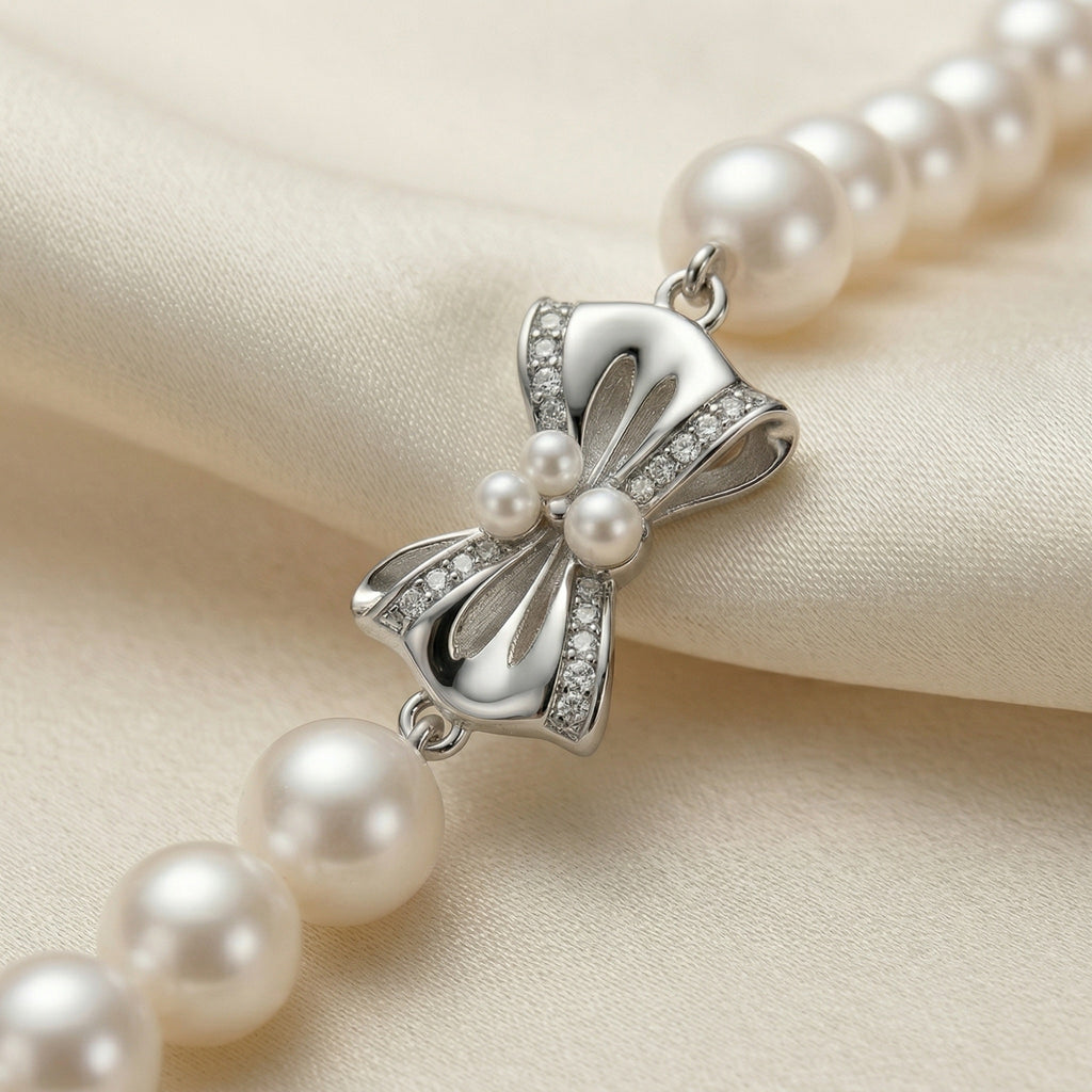 Elegant Pearl Necklace with Silver Butterfly Pendant