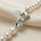 Elegant Pearl Necklace with Silver Butterfly Pendant