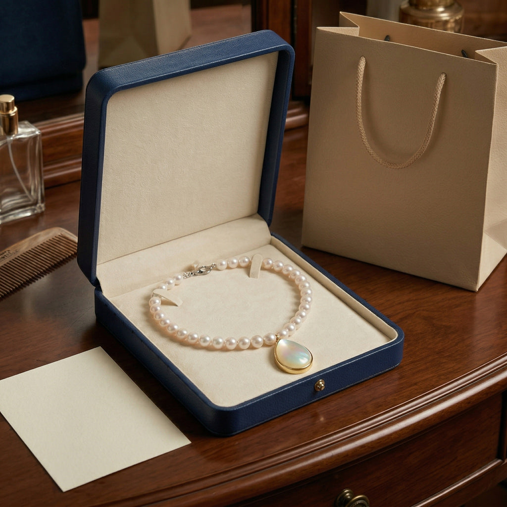 Elegant Pearl Necklace with Teardrop Mother-of-Pearl Pendant