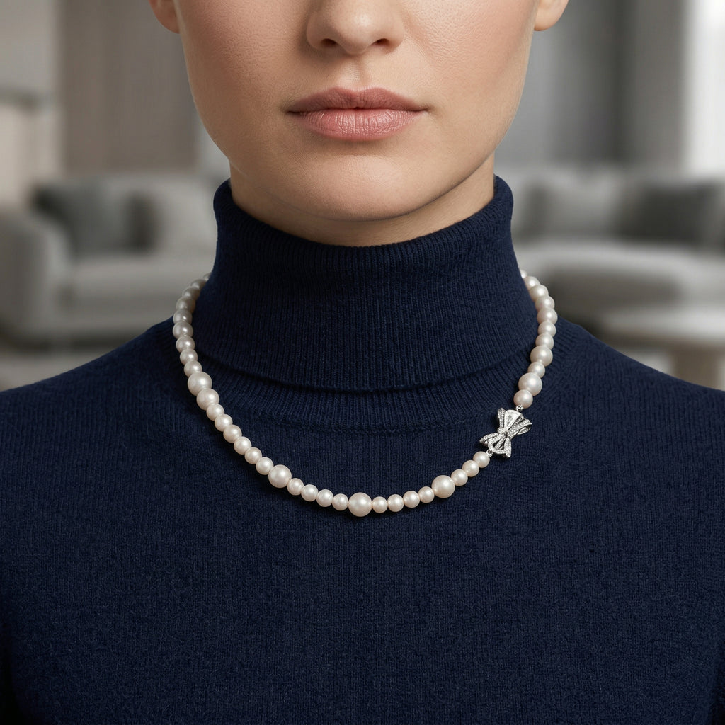 Elegant Pearl Necklace with Silver Butterfly Pendant